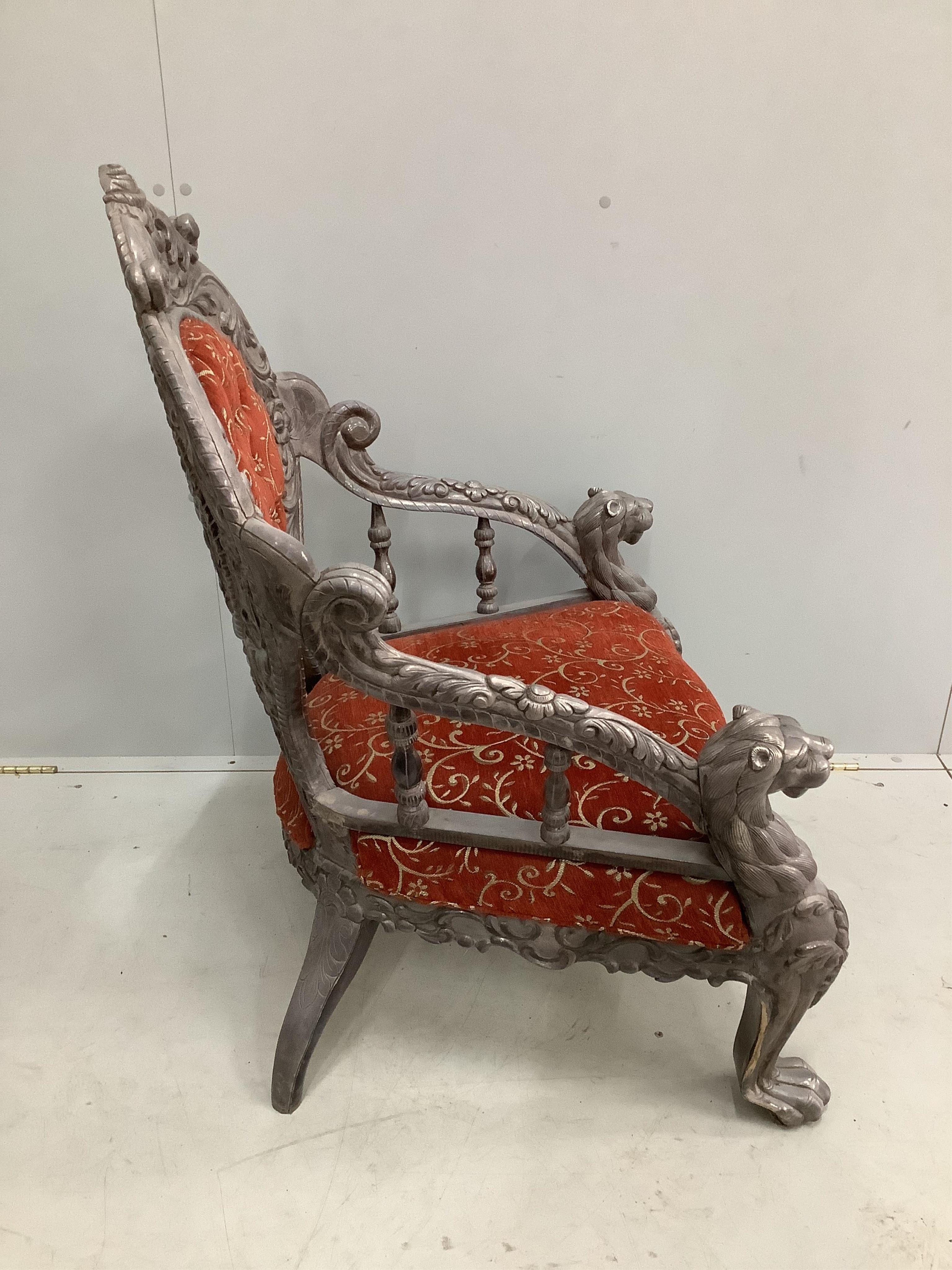 An Indian white metal overlaid armchair, width 72cm, depth 55cm, height 98cm. Condition - good